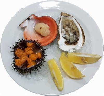 Высокая кухня, из блюд, созданных самой природой - живые морепродукты. 